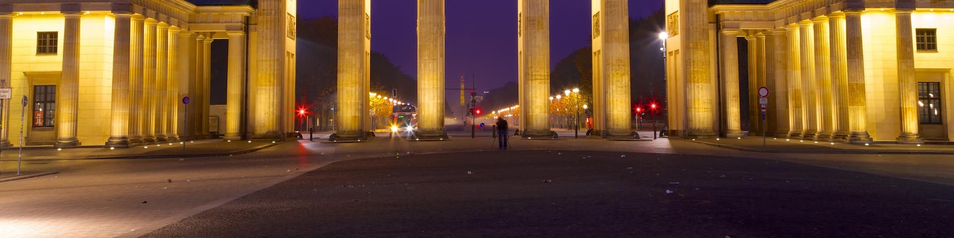 Brandenburg Gate which includes a city, a square or plaza and night scenes