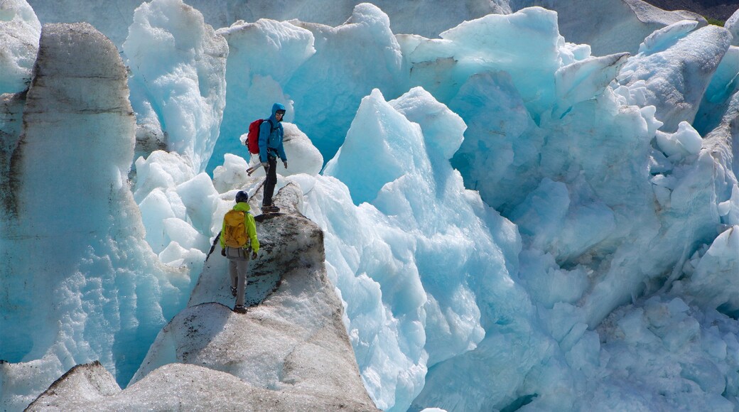 Seward featuring hiking or walking and snow as well as a couple