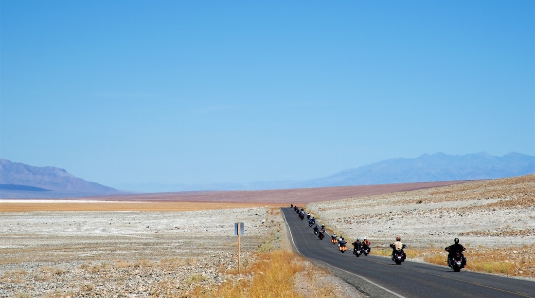 Badwater which includes desert views, landscape views and motorbike riding