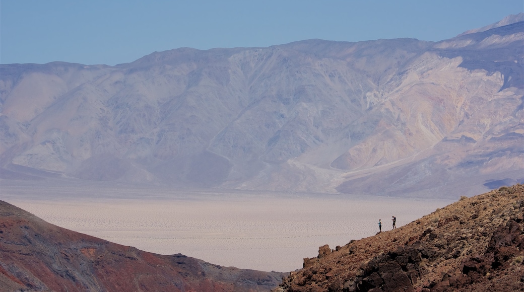 Death Valley showing mountains and desert views as well as a couple