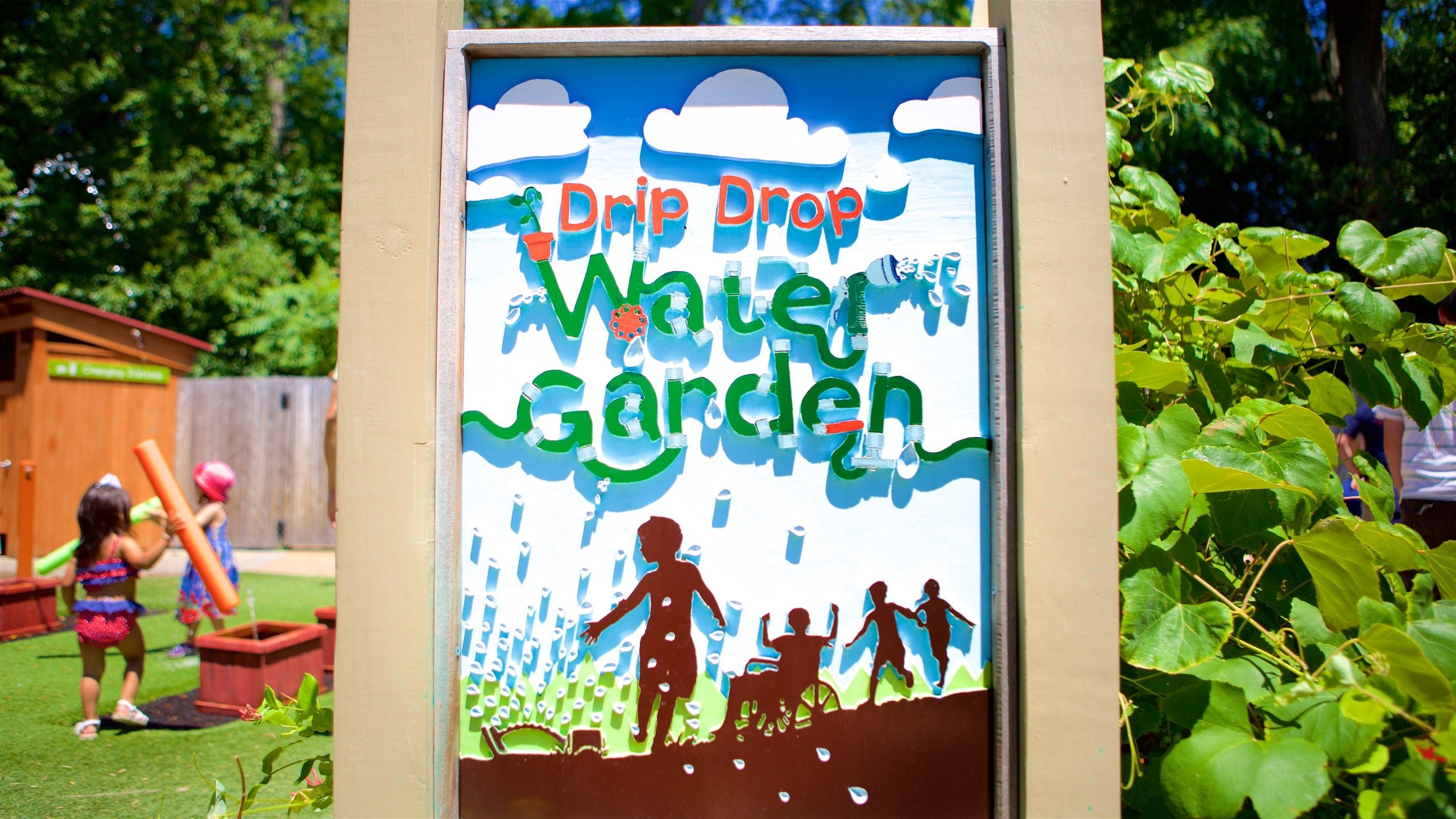 Roger Williams Park Zoo showing signage as well as children