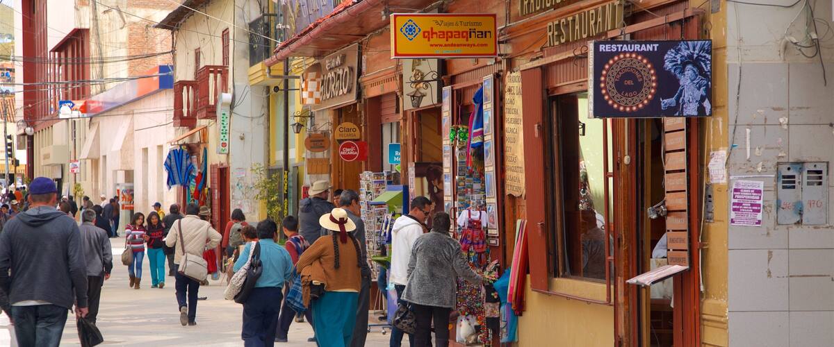 Lake Titicaca which includes a city as well as a small group of people