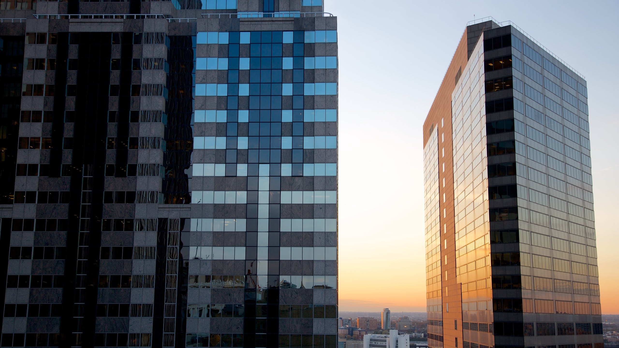 Philadelphia which includes a sunset, a high rise building and a city