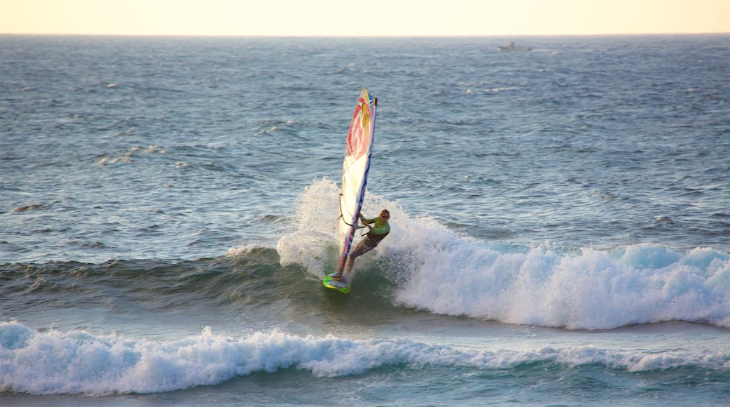 Hookipa Beach Park featuring kite surfing, a sunset and general coastal views