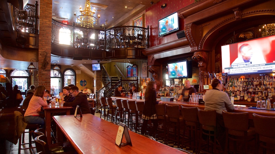 Hell\'s Kitchen featuring a bar, interior views and dining out