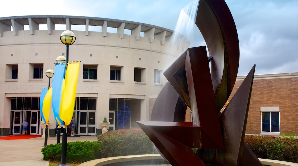 Orlando Museum of Art featuring a fountain and outdoor art