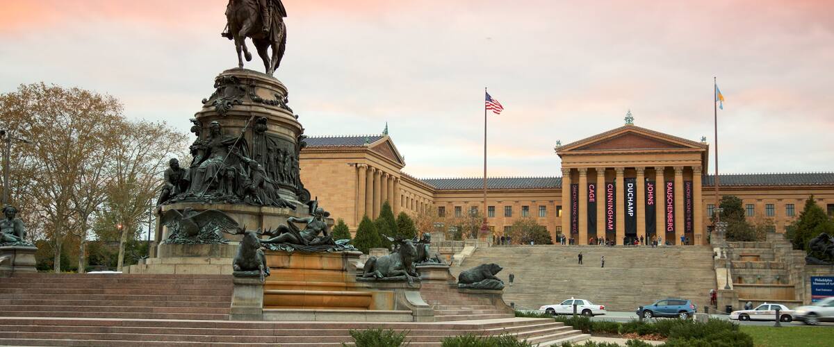 Philadelphia Museum of Art which includes a sunset, a statue or sculpture and heritage elements