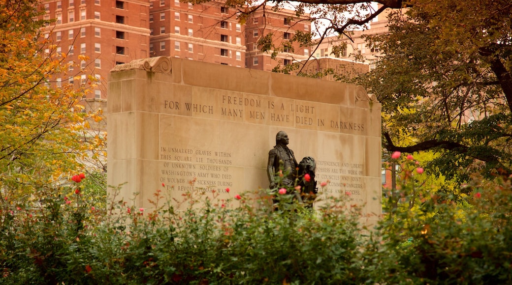 Tomb of the Unknown Soldier of the American Revolution featuring a park, fall colors and a statue or sculpture