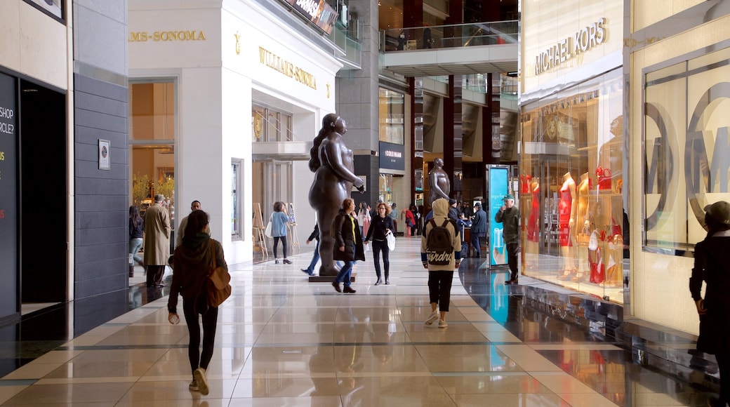 Time Warner Center showing shopping, outdoor art and interior views