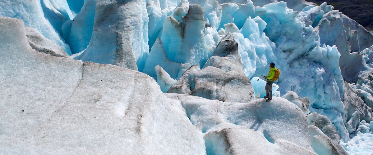 Godwin Glacier showing climbing and snow as well as an individual male