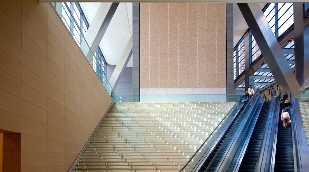 Hearst Tower featuring interior views as well as a small group of people