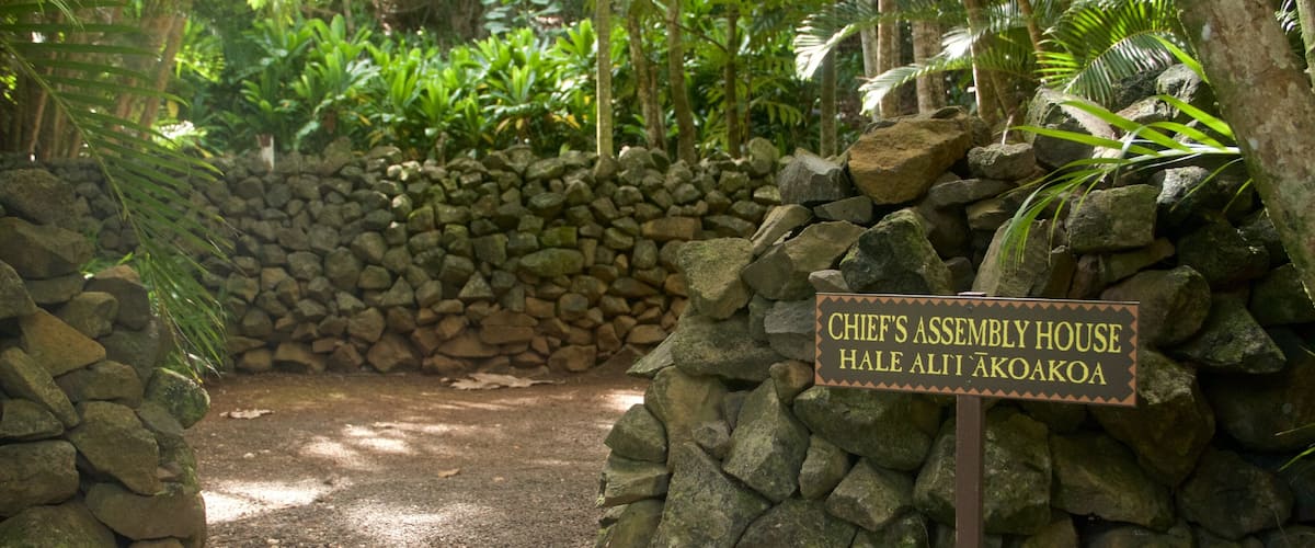 Kamokila Hawaiian Village featuring signage and a park