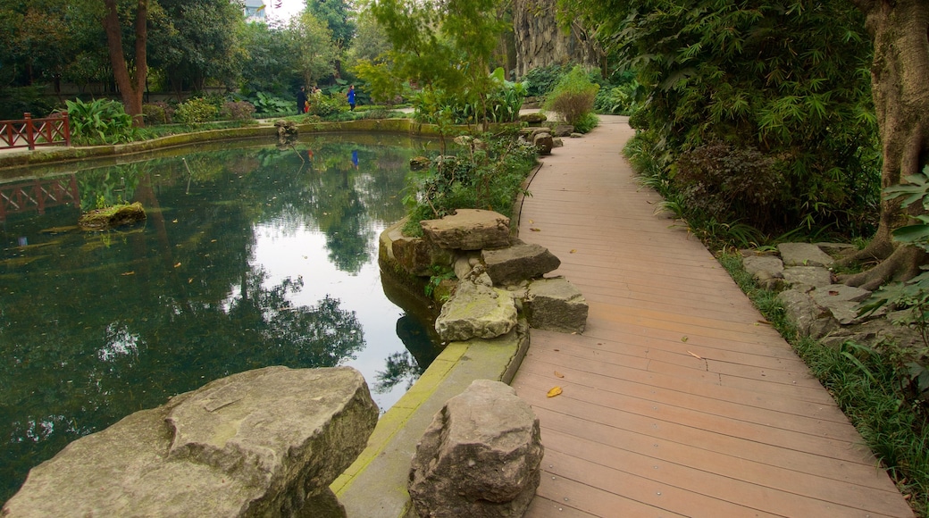 Baihuatan Park which includes a park and a pond