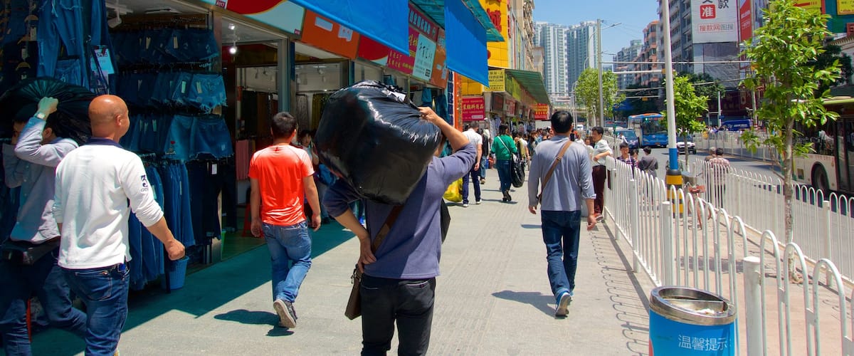 Tianhe showing a city as well as a small group of people