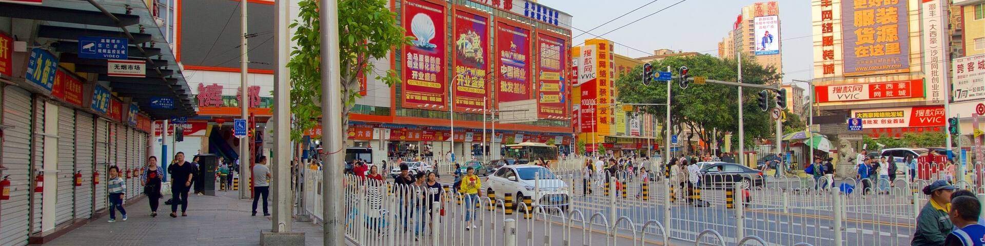 Tianhe which includes a city, a sunset and signage