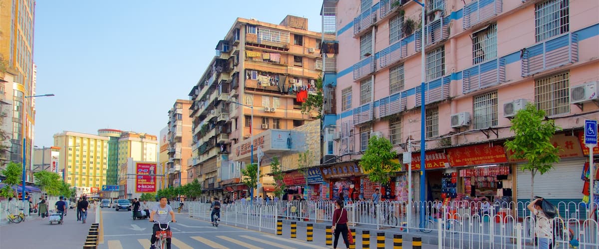 Tianhe showing a city as well as a small group of people