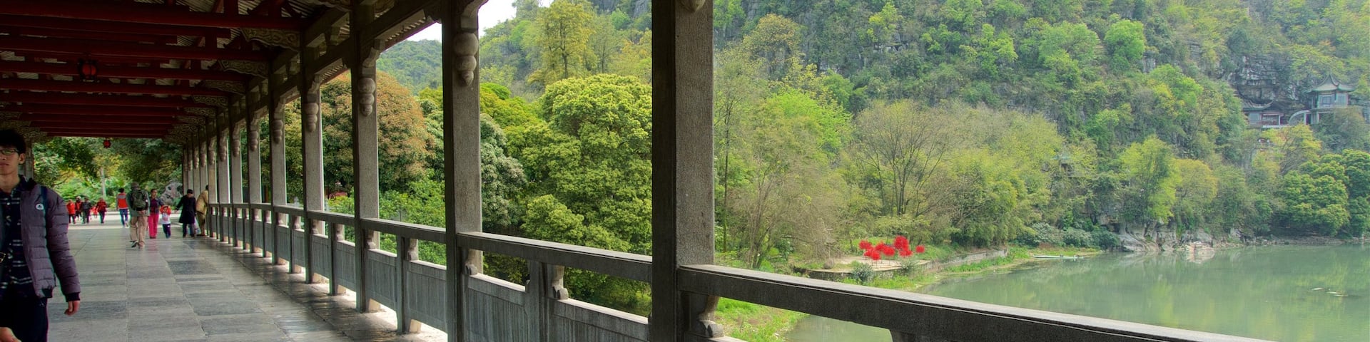 Seven-Star Park featuring a lake or waterhole and a bridge