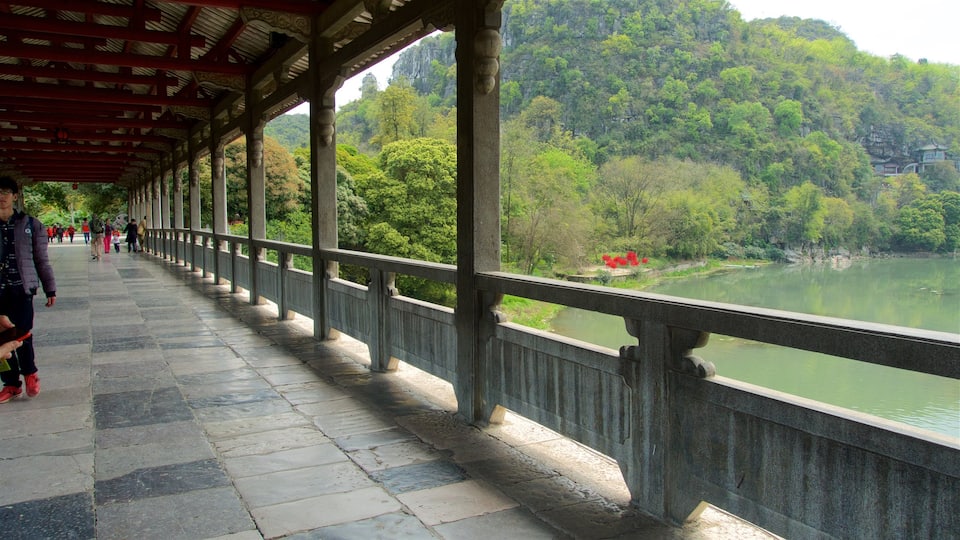 Seven-Star Park featuring a lake or waterhole and a bridge