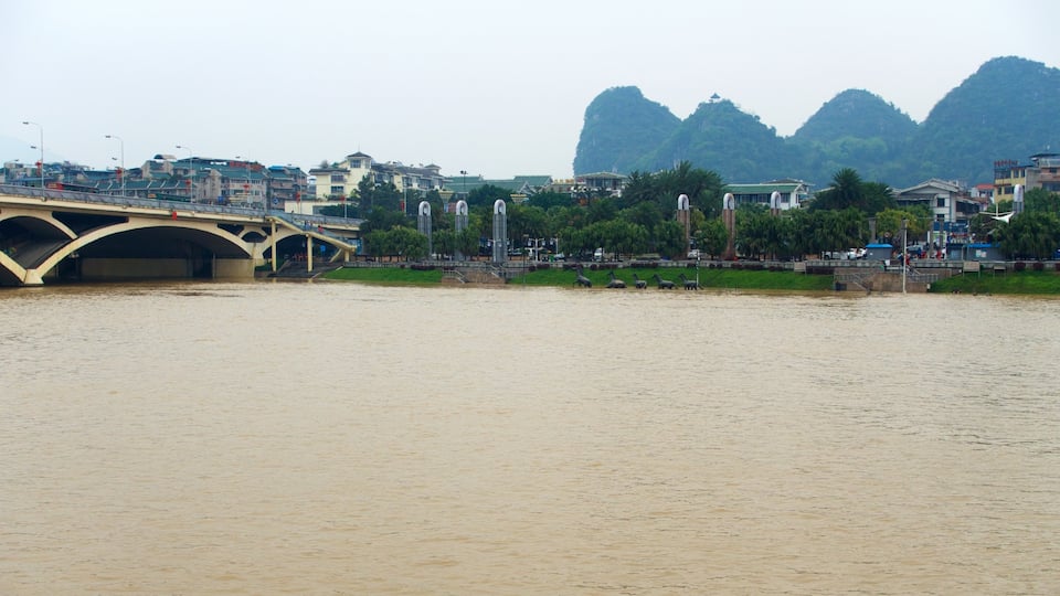 Guilin showing a bridge and a river or creek