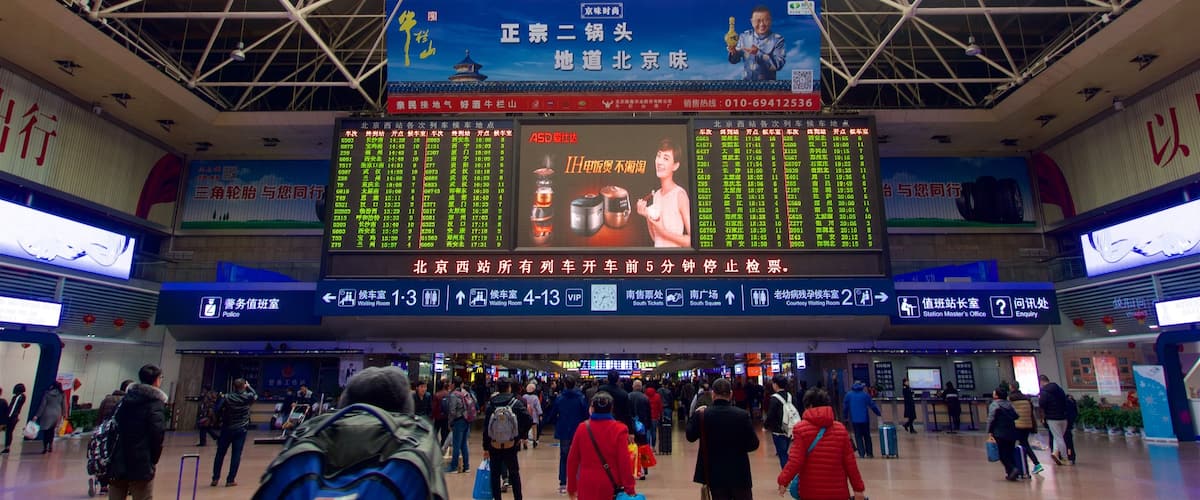 Fengtai which includes interior views and signage as well as a small group of people