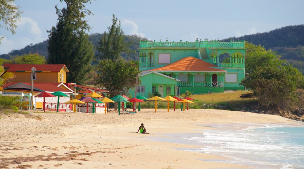 Runaway Bay Beach which includes general coastal views and a sandy beach