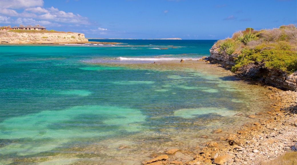 Devil\'s Bridge which includes rugged coastline and general coastal views