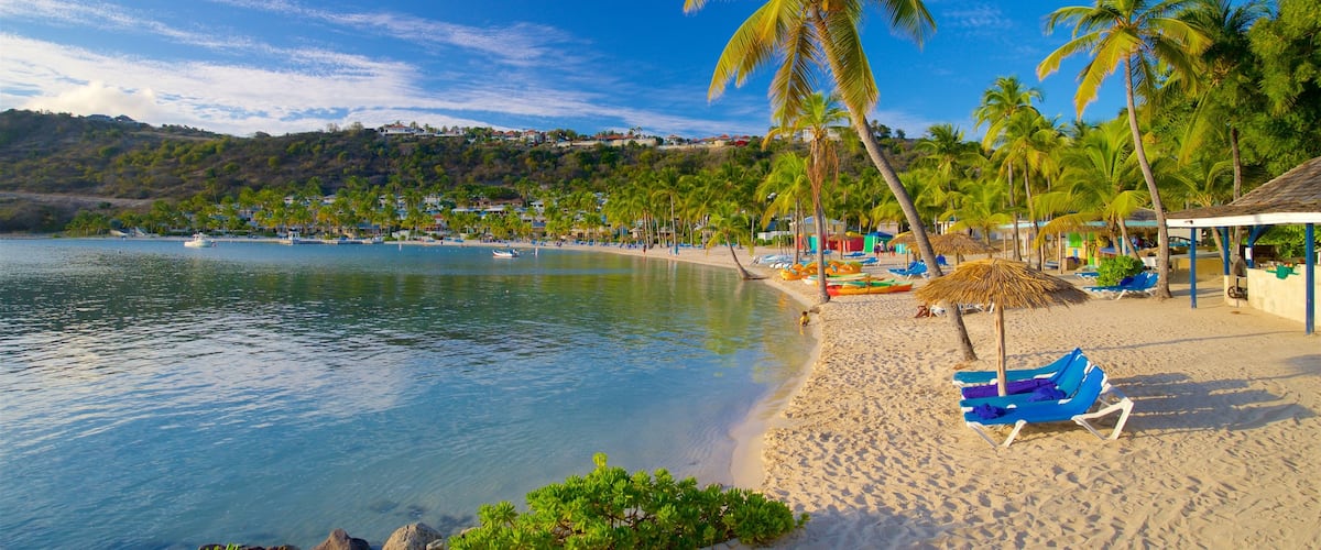 Bahía de Mamora que incluye escenas tropicales, vistas generales de la costa y una playa