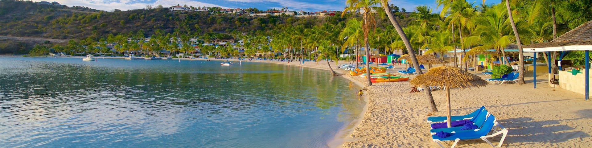Bahía de Mamora que incluye escenas tropicales, vistas generales de la costa y una playa