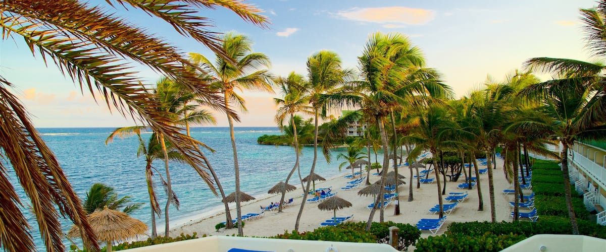 Mamora Bay featuring tropical scenes, general coastal views and a luxury hotel or resort