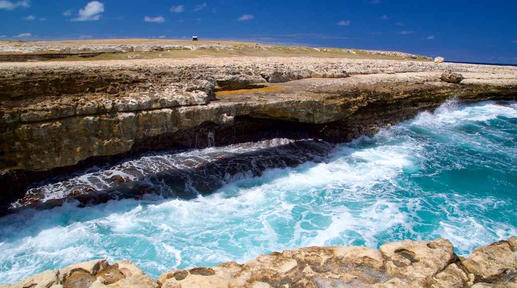 Devil\'s Bridge featuring rocky coastline, general coastal views and waves