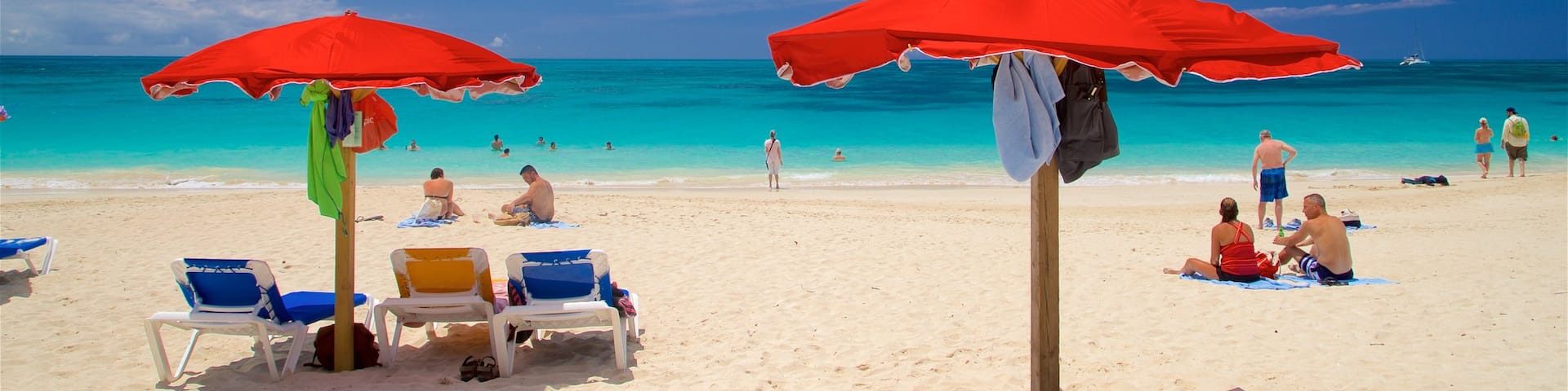 Darkwood Beach which includes a beach and general coastal views as well as a small group of people