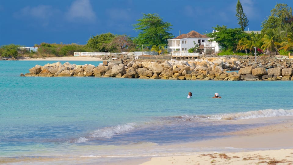 Runaway Bay Beach featuring tropical scenes, a beach and general coastal views