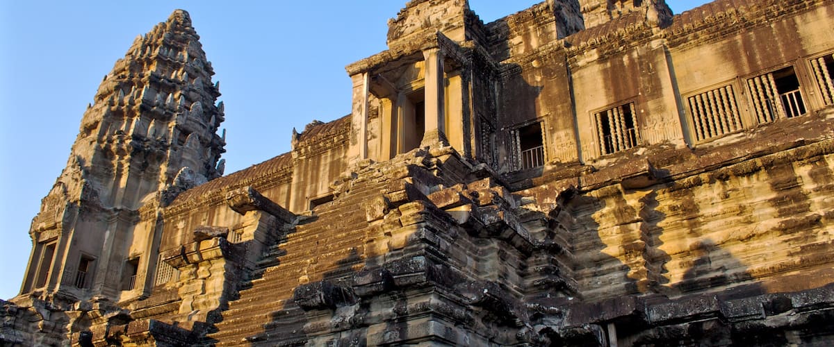 Angkor Wat which includes a temple or place of worship and heritage architecture