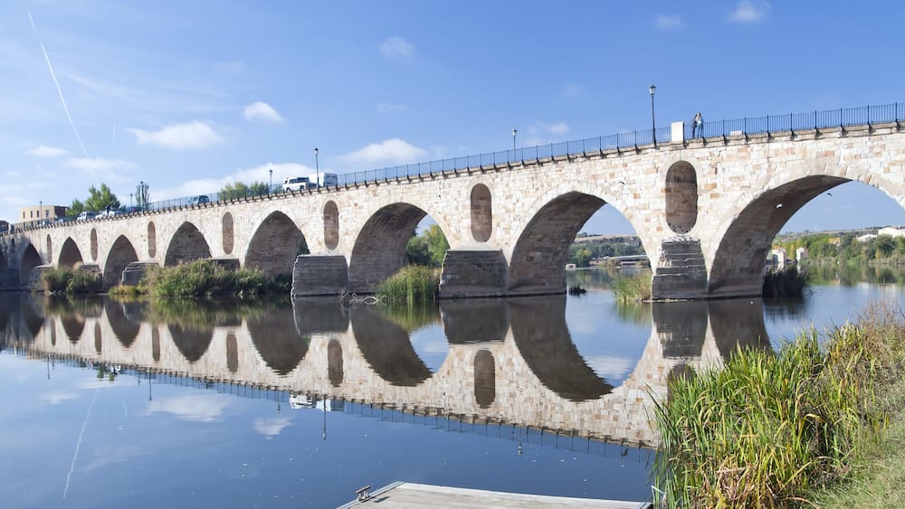 Zamora featuring a river or creek and a bridge