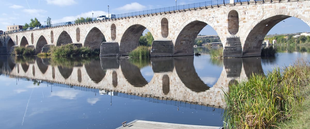 Zamora featuring a river or creek and a bridge