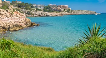 Salou which includes rugged coastline, a coastal town and general coastal views