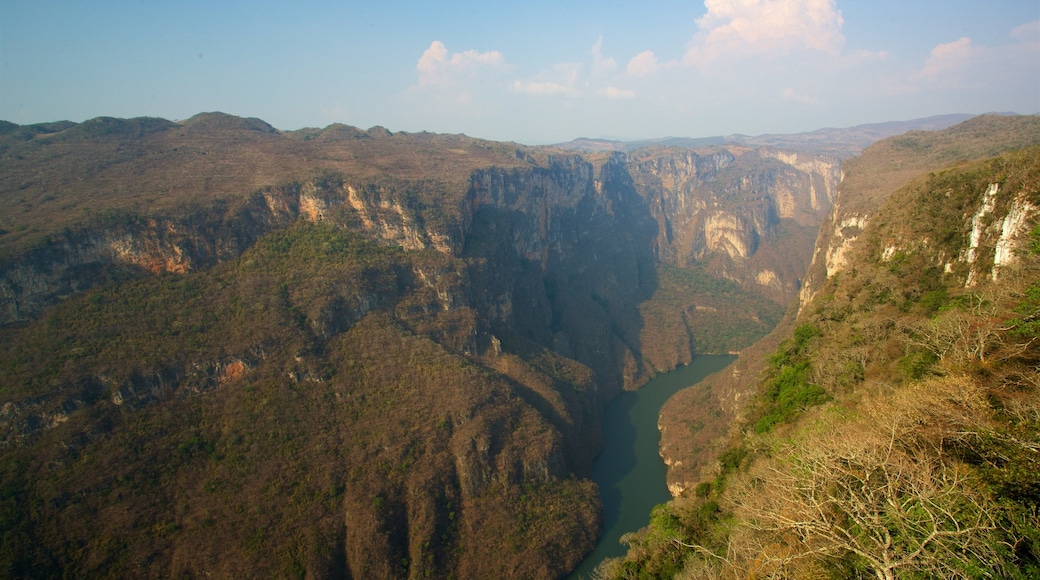 Manos que Imploran Viewpoint which includes landscape views, a river or creek and a gorge or canyon