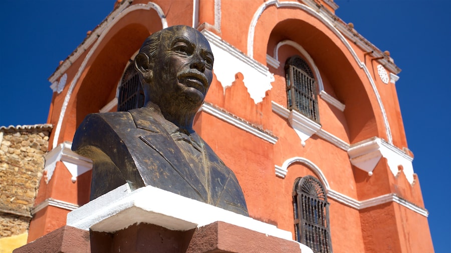 Arches of Carmen featuring heritage elements and a statue or sculpture