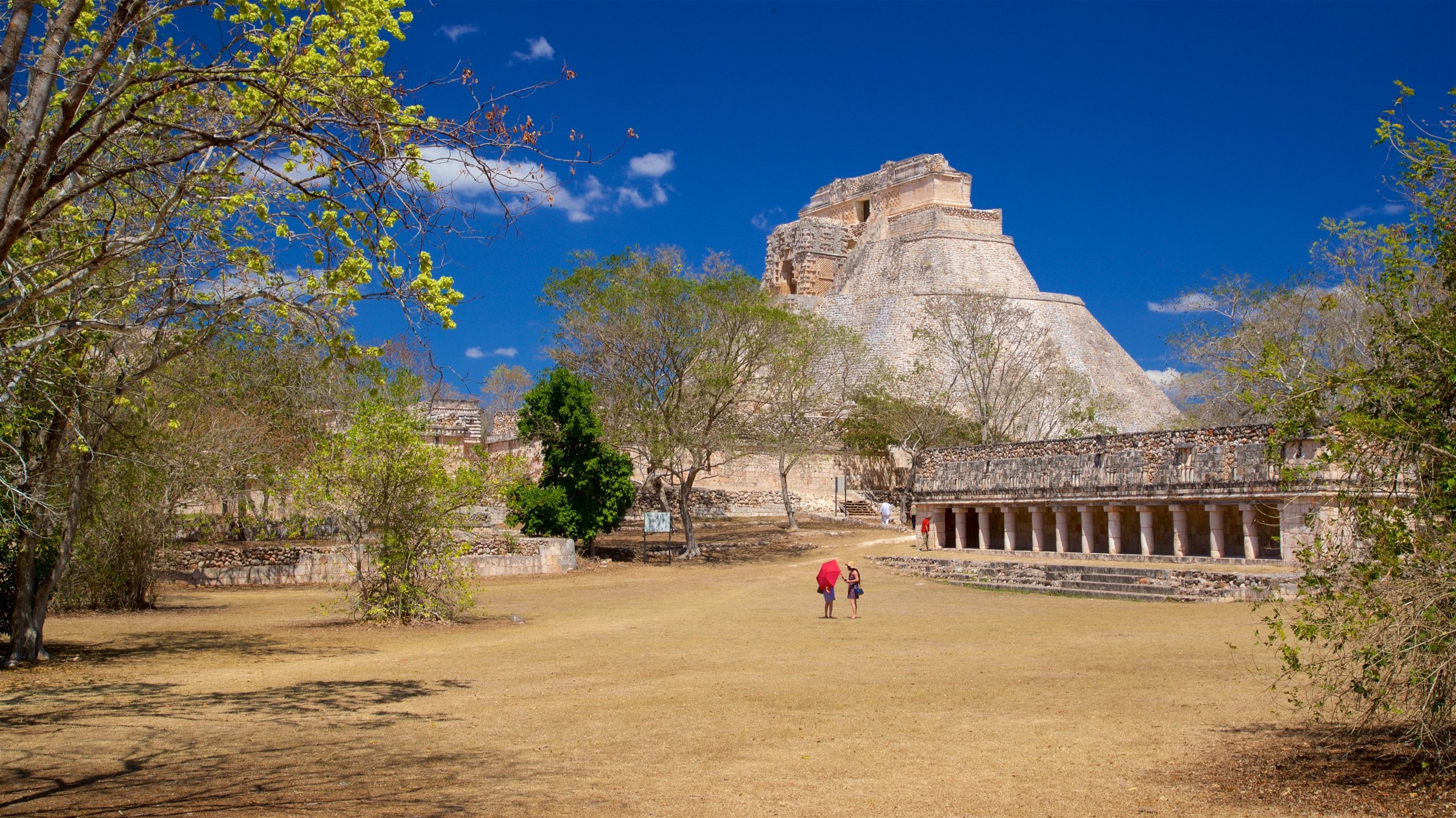 Pyramid of the Magician which includes heritage architecture as well as a couple