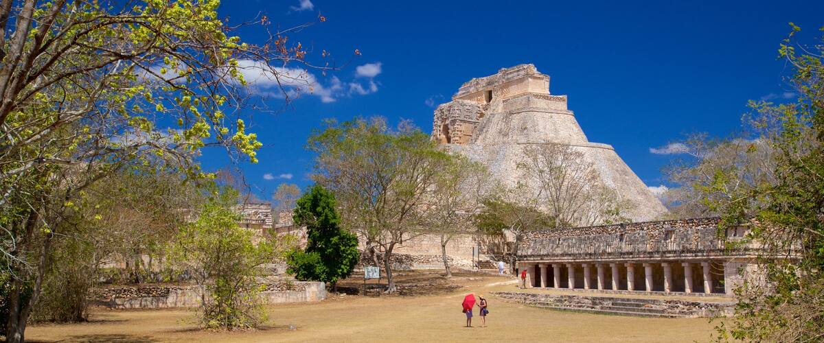 Pyramid of the Magician which includes heritage architecture as well as a couple