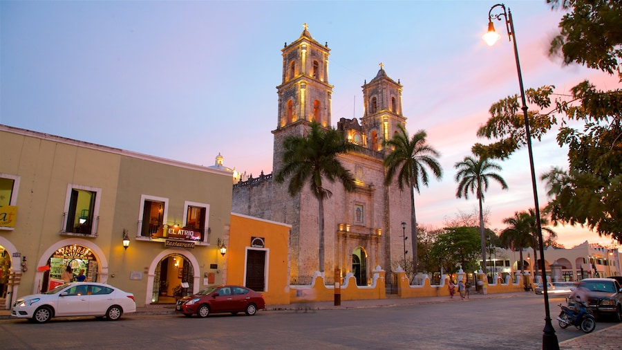 Cathedral of San Gervasio showing heritage architecture, a church or cathedral and a sunset