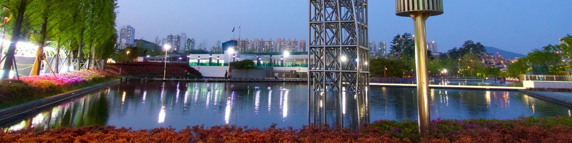 Busanjin featuring wild flowers and a lake or waterhole