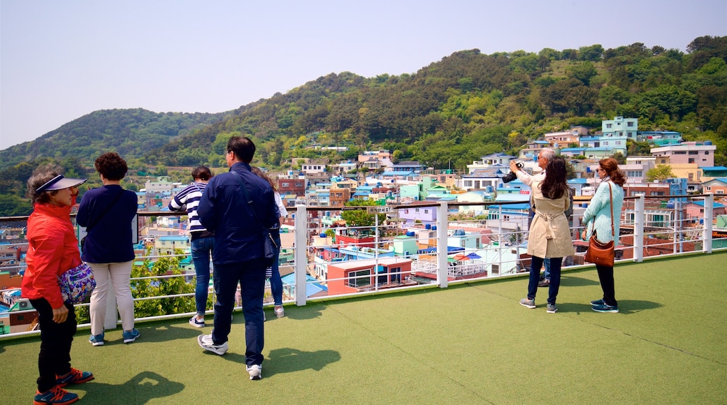 Gamcheon Culture Village showing views and a city as well as a small group of people