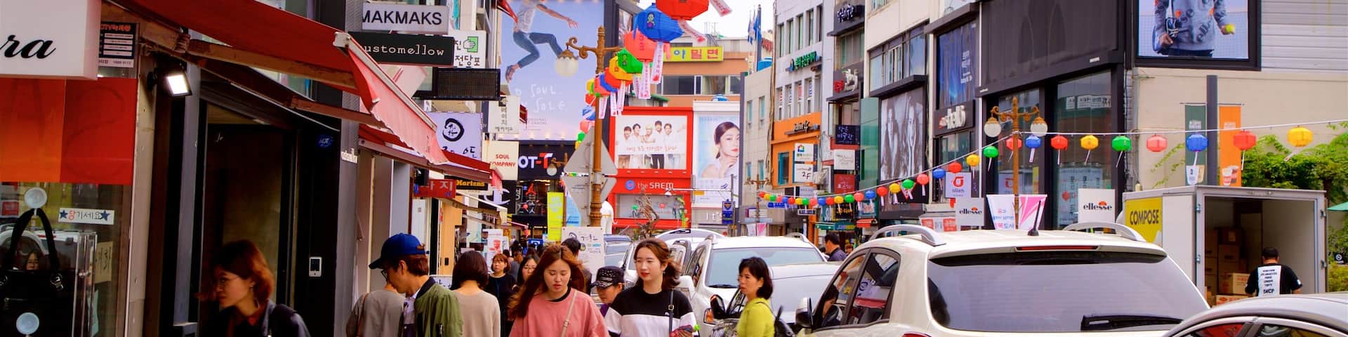 Gwangbokro Culture and Fashion Street showing signage, a city and central business district