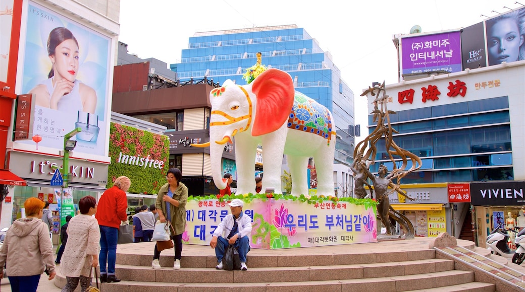 Gwangbokro Culture and Fashion Street showing cbd, a city and signage