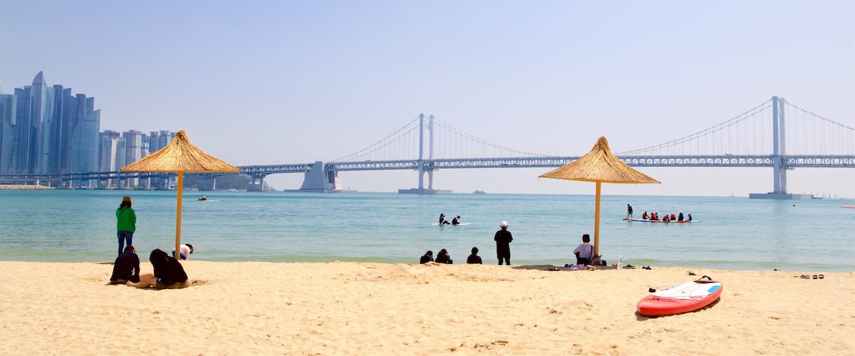 Gwangalli Beach which includes general coastal views, a coastal town and a bridge