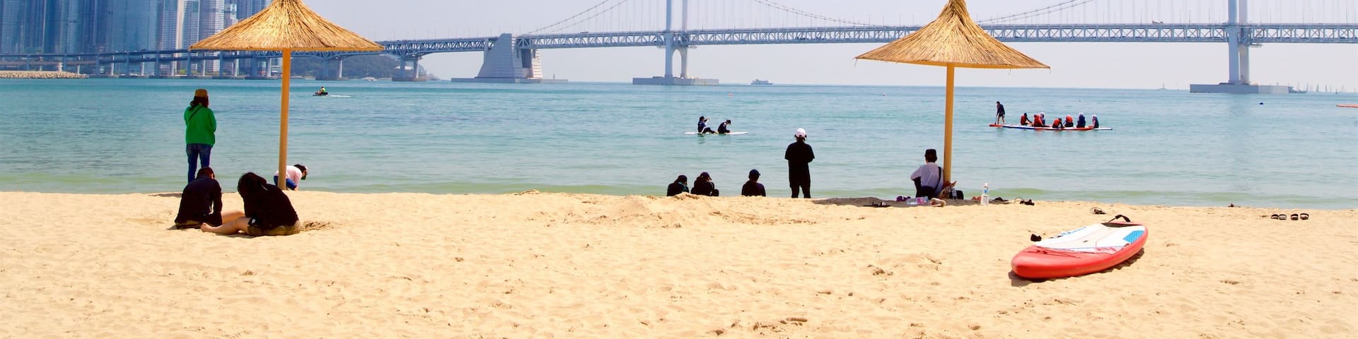 Gwangalli Beach which includes general coastal views, a coastal town and a bridge