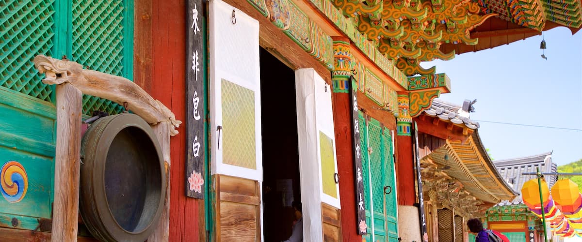 Beomeo-sa Temple showing heritage elements as well as a couple