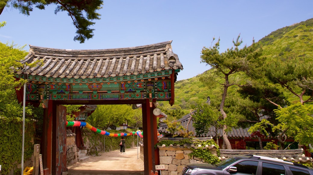 Beomeo-sa Temple featuring heritage elements and mountains