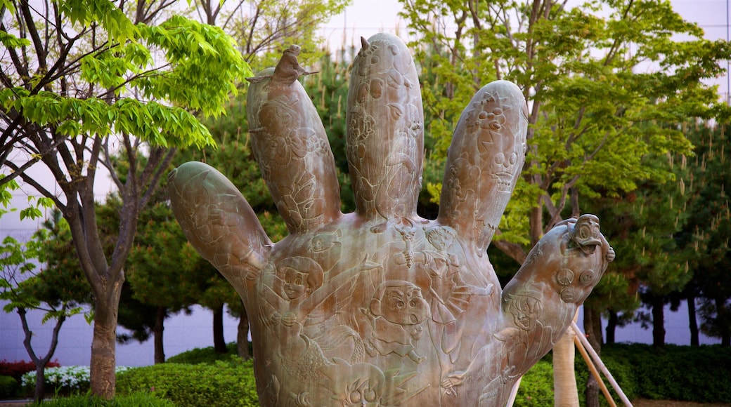 Busan Museum of Art featuring a garden and outdoor art